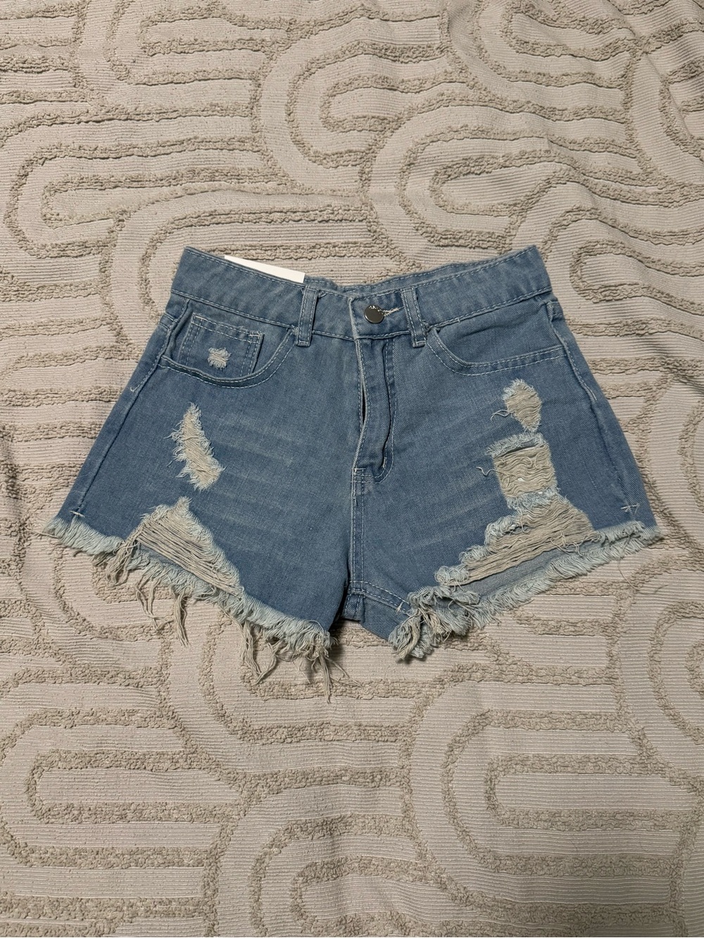 High-Rise Distressed Denim Shorts — Blue